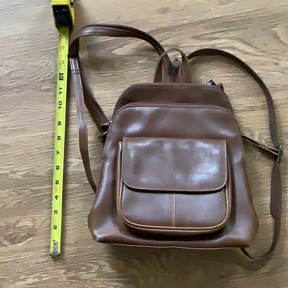 Brown women’s leather backpack, purse style